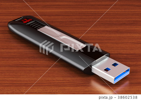 USB flash drive on the wooden table. 3D rendering 38602538