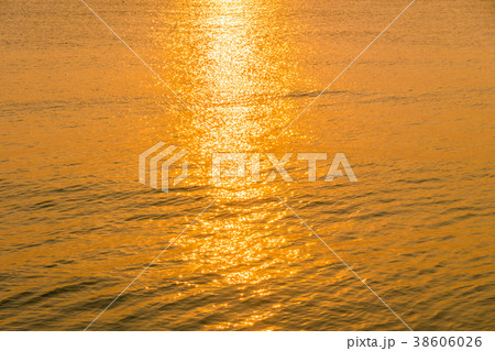 Beautiful sunrise on the beach and sea Beautiful sunrise on the beach and sea 38606026