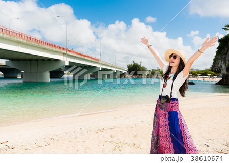 Cheerful girl in Naminoue Beach. Cheerful girl in Naminoue Beach. 38610674
