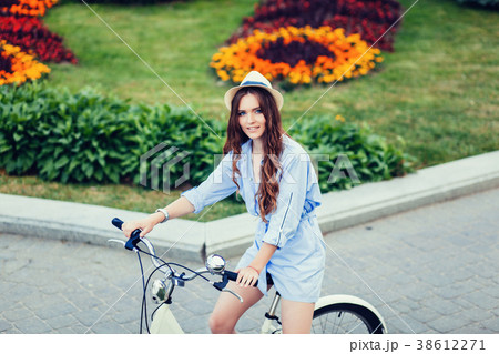 girl with bicycle 38612271