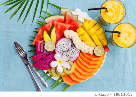 Tropical fruits assortment Mango smoothie Top view 38613015