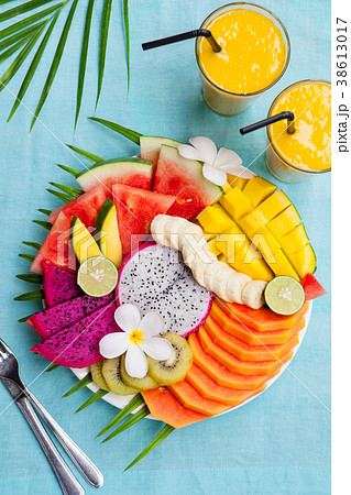 Tropical fruits assortment Mango smoothie Top view 38613017