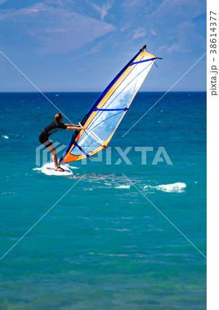 windsurfer at sea off the coast of Corfu, Greece windsurfer at sea off the coast of Corfu, Greece 38614377