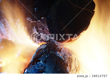 Natural firewood in the fireplace, detail view Natural firewood in the fireplace, detail view 38614797