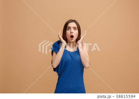 Beautiful woman looking suprised isolated on Beautiful woman looking suprised isolated on 38615594