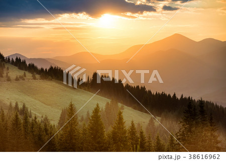 Beautiful sunset in the mountains Beautiful sunset in the mountains 38616962