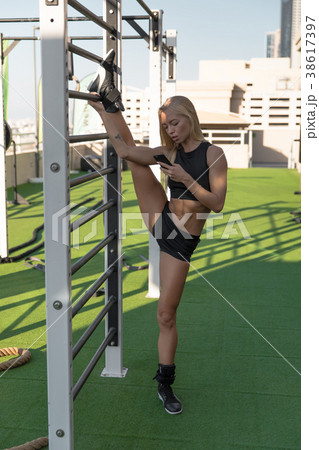 Fitness woman doing stretching workout. 38617397