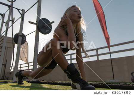 Fitness woman doing stretching workout. 38617399