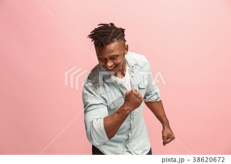 Winning success man happy ecstatic celebrating 38620672