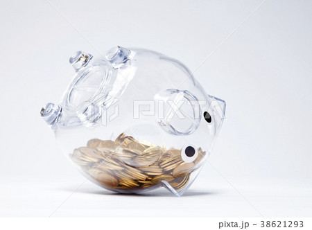 Transparent piggy bank with golden coins Transparent piggy bank with golden coins 38621293