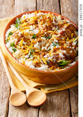 Delicious homemade biryani with chicken 38627956