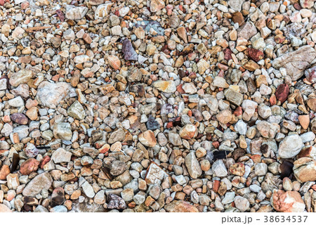 Sand and stone on the beach Sand and stone on the beach 38634537