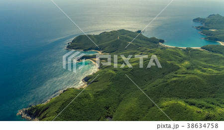 Aerial view of clean water sea and sand coast Aerial view of clean water sea and sand coast 38634758