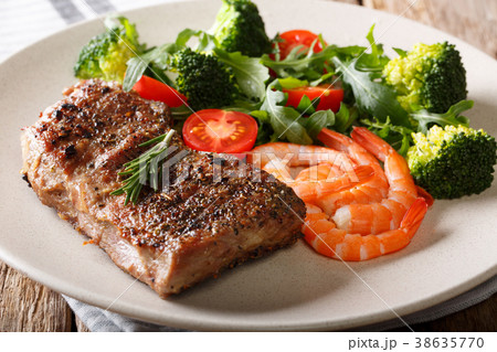 Surf and Turf. Beef steak with royal prawns Surf and Turf. Beef steak with royal prawns 38635770