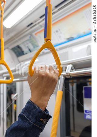 Tourist man hand holding a handrails of train 38636210