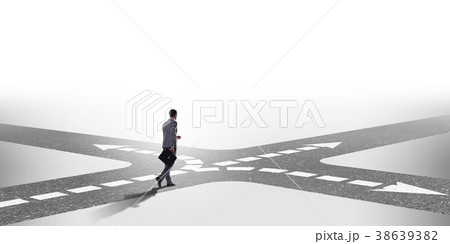 Young businessman at crossroads in uncertainty Young businessman at crossroads in uncertainty 38639382
