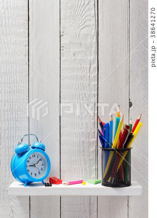 school supplies and tools at wooden shelf 38641270