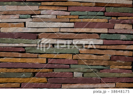 Brick wall colorful abstract background 38648175