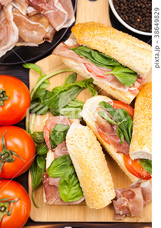 Close up on healthy sandwiches lying on wooden Close up on healthy sandwiches lying on wooden 38649829