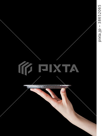 Female hand holds stainless steel catering tray 38652065