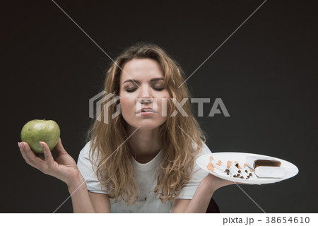 Calm woman making her choice Calm woman making her choice 38654610