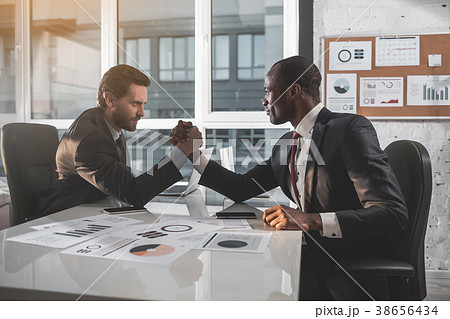 Young managers are competing in office 38656434