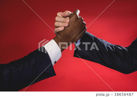 Friendly handshake of skilled businessmen 38656487