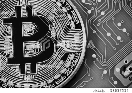 close up of Golden Bitcoin money on computer. close up of Golden Bitcoin money on computer. 38657532