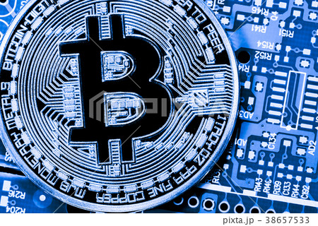 close up of Golden Bitcoin money on computer. close up of Golden Bitcoin money on computer. 38657533