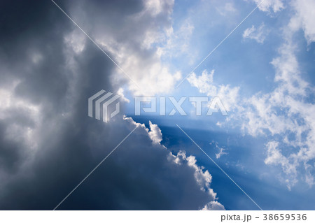 Clouds gathered in the sky under the sun. Clouds gathered in the sky under the sun. 38659536