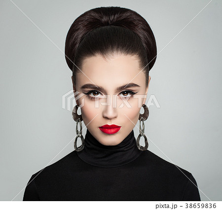 Stylish Young Woman with Hair Bun Hairdo Stylish Young Woman with Hair Bun Hairdo 38659836
