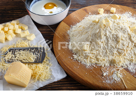 mix of flour, grated cheese and butter mix of flour, grated cheese and butter 38659910