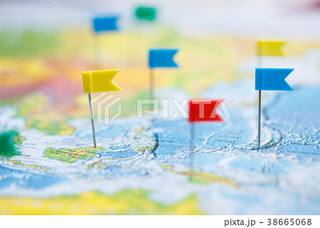 Macro photo with flag pushpins and world map Macro photo with flag pushpins and world map 38665068