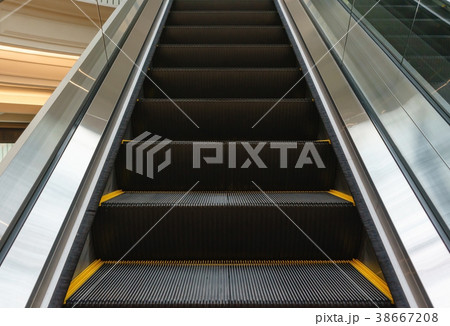 Escalator in Community Mall, Shopping Center. Escalator in Community Mall, Shopping Center. 38667208