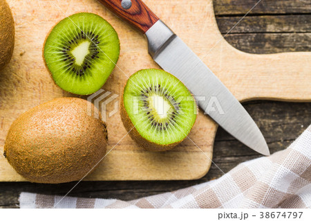 Halved kiwi fruit. Halved kiwi fruit. 38674797