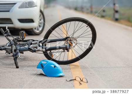 Accident car crash with bicycle on road 38677927