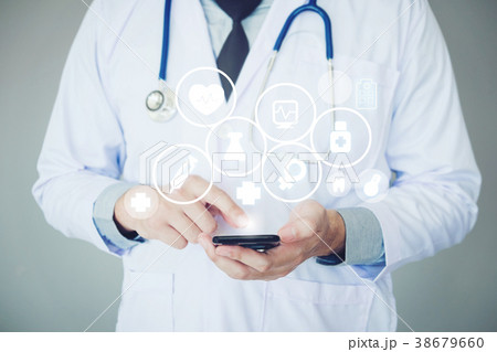Doctor using smartphone and health care icon  38679660