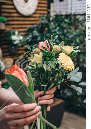 Florist arrangement a flowers bouquet 38684150
