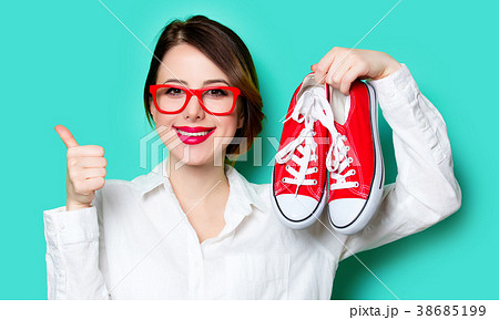 young woman with gumshoes young woman with gumshoes 38685199