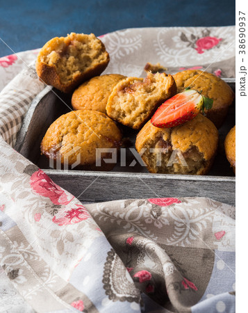 Peanut butter muffins with strawberry jam Peanut butter muffins with strawberry jam 38690937