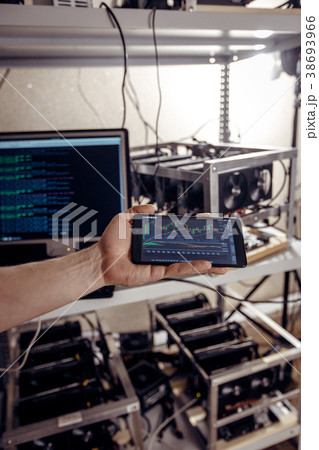 The man shows the dynamics on the display The man shows the dynamics on the display 38693966