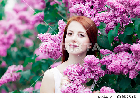 girl in lilac garden in springtime girl in lilac garden in springtime 38695039