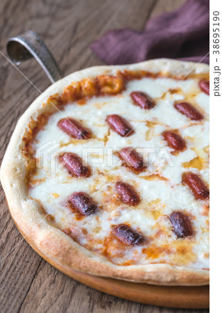Pizza with mozzarella and salami 38695190