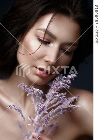 Beautiful woman with a light natural make-up and Beautiful woman with a light natural make-up and 38696813