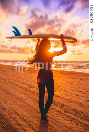 Surf girl with long hair go to surfing. Surf girl with long hair go to surfing. 38696955