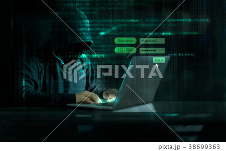 Hacker using laptop for data thef, dark background Hacker using laptop for data thef, dark background 38699363