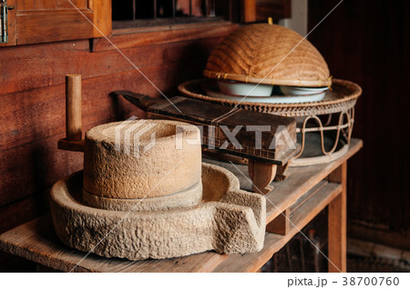 vintage antique millstone grinder in Thai kitchen 38700760