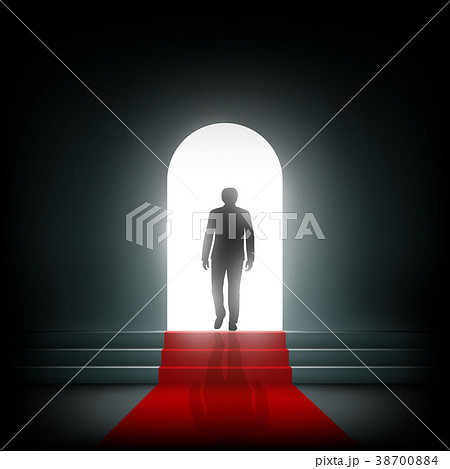 Man goes to the light on the red carpet. Man goes to the light on the red carpet. 38700884