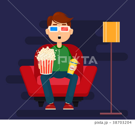 Young man sittingat home and watching movie 38703204
