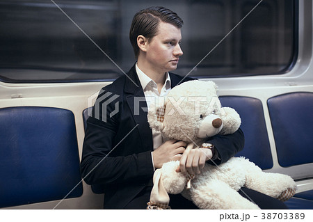 Young man in a subway car. Young man in a subway car. 38703389